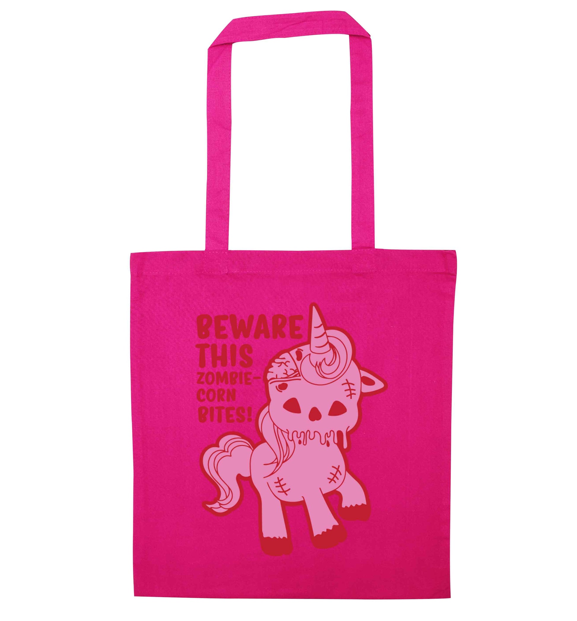 Beware this zombiecorn bites pink tote bag