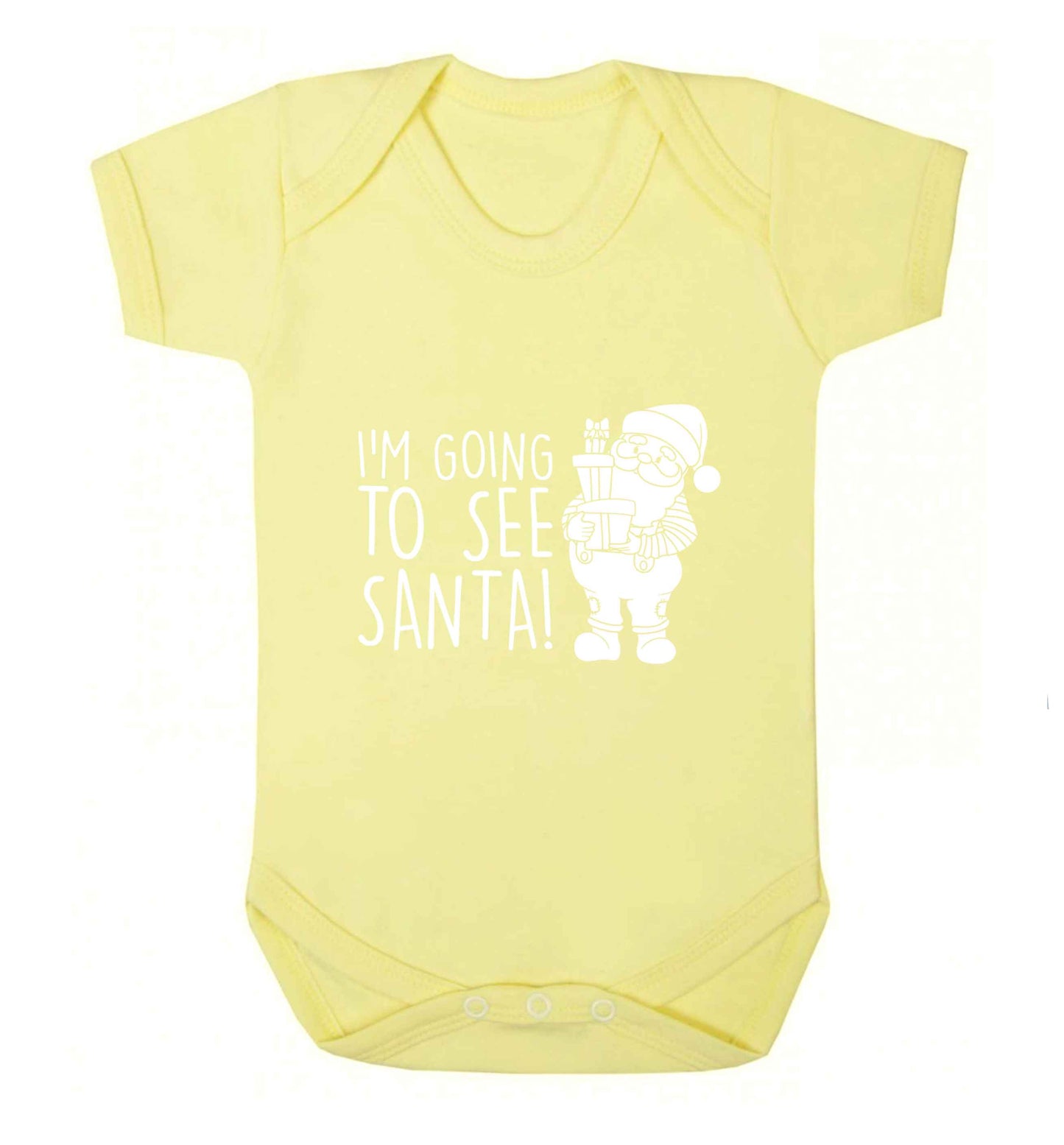 Merry Christmas baby vest pale yellow 18-24 months