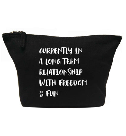 Currently in a long term relationship with freedom and fun | Makeup / wash bag
