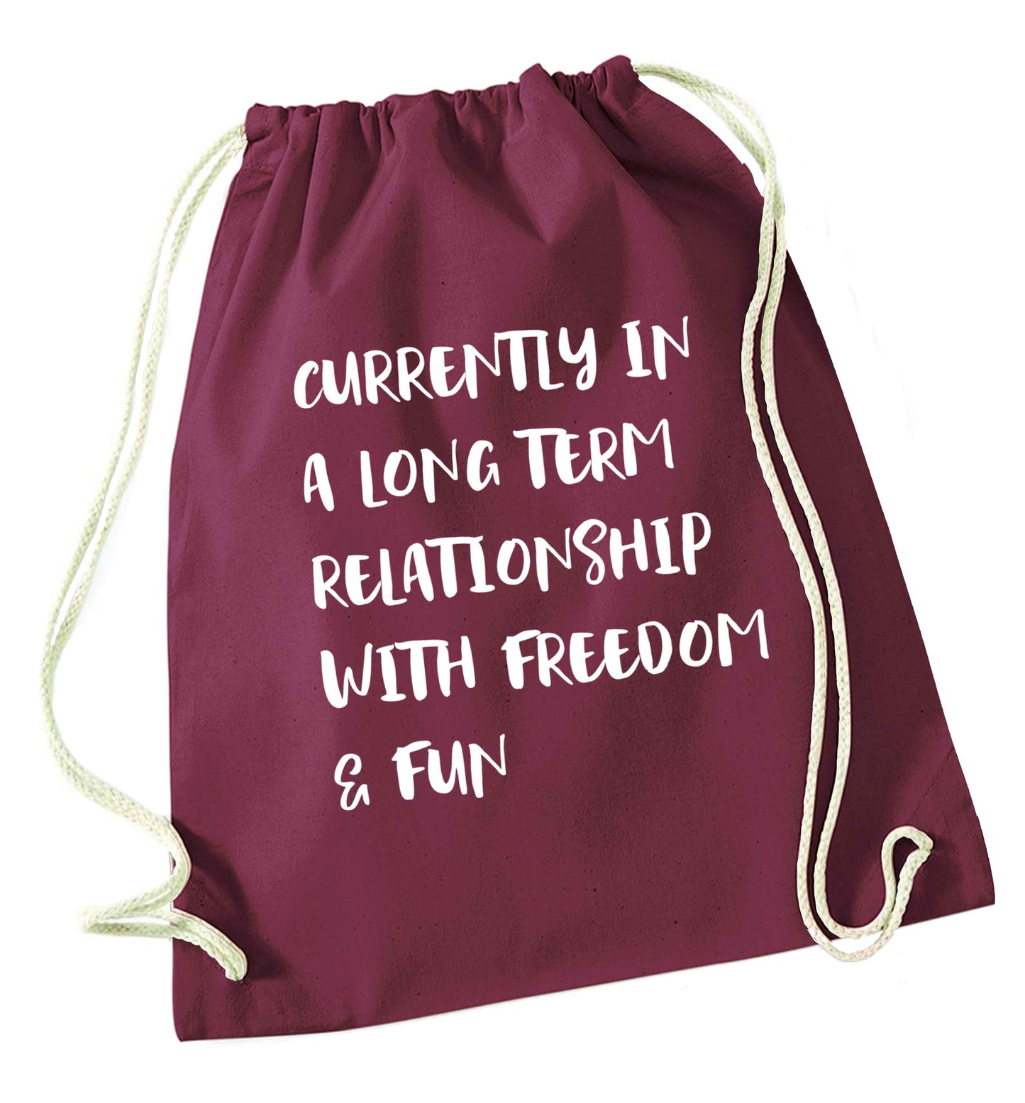 Currently in a long term relationship with freedom and fun maroon drawstring bag