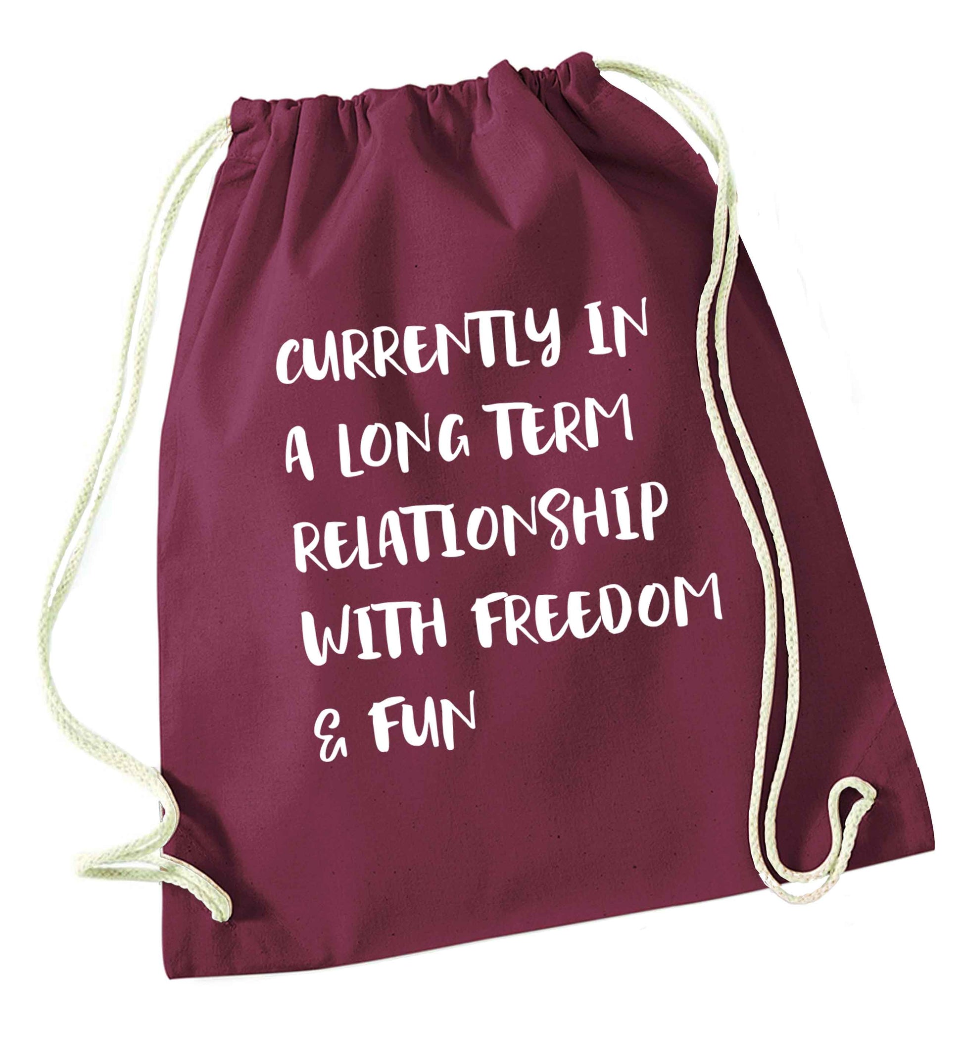 Currently in a long term relationship with freedom and fun maroon drawstring bag