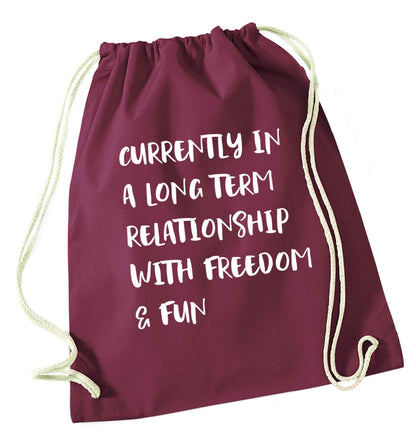 Currently in a long term relationship with freedom and fun maroon drawstring bag