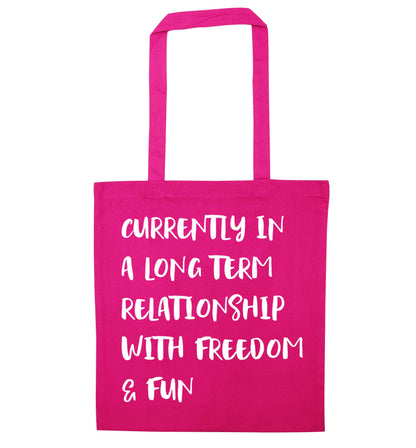 Currently in a long term relationship with freedom and fun pink tote bag