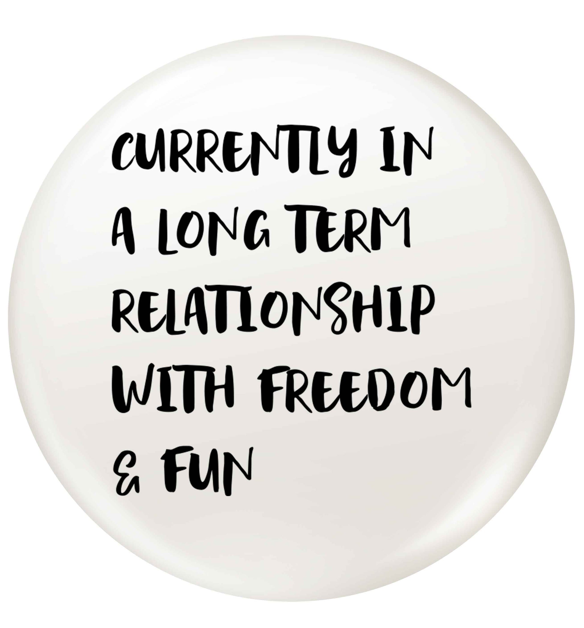 Currently in a long term relationship with freedom and fun small 25mm Pin badge
