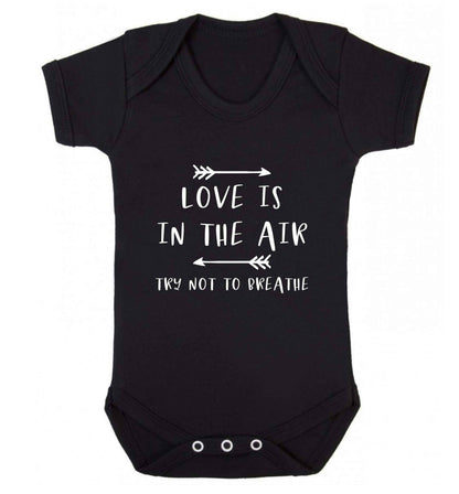 Love is in the air try not to breathe baby vest black 18-24 months