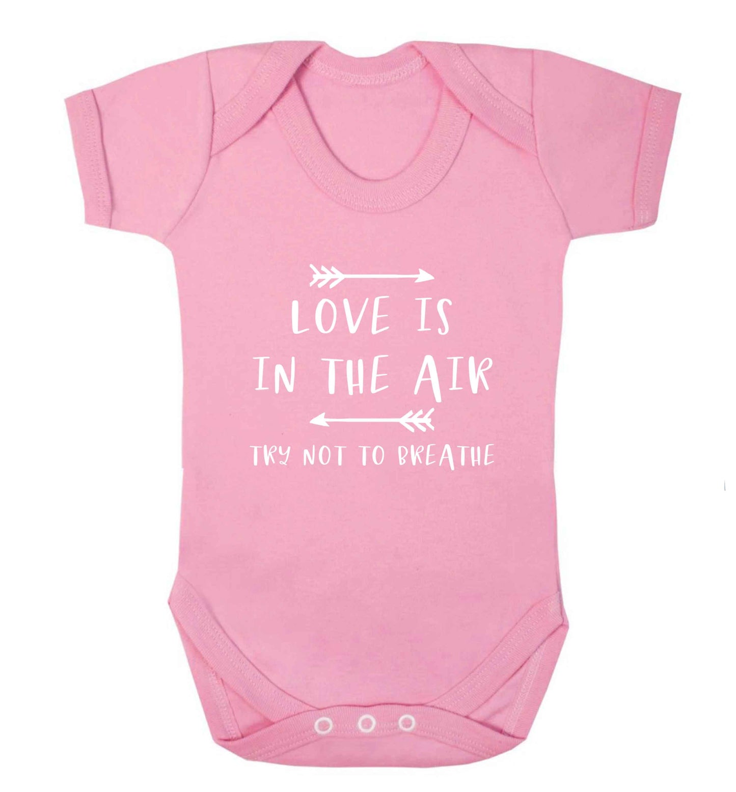 Love is in the air try not to breathe baby vest pale pink 18-24 months
