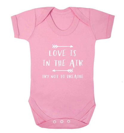 Love is in the air try not to breathe baby vest pale pink 18-24 months