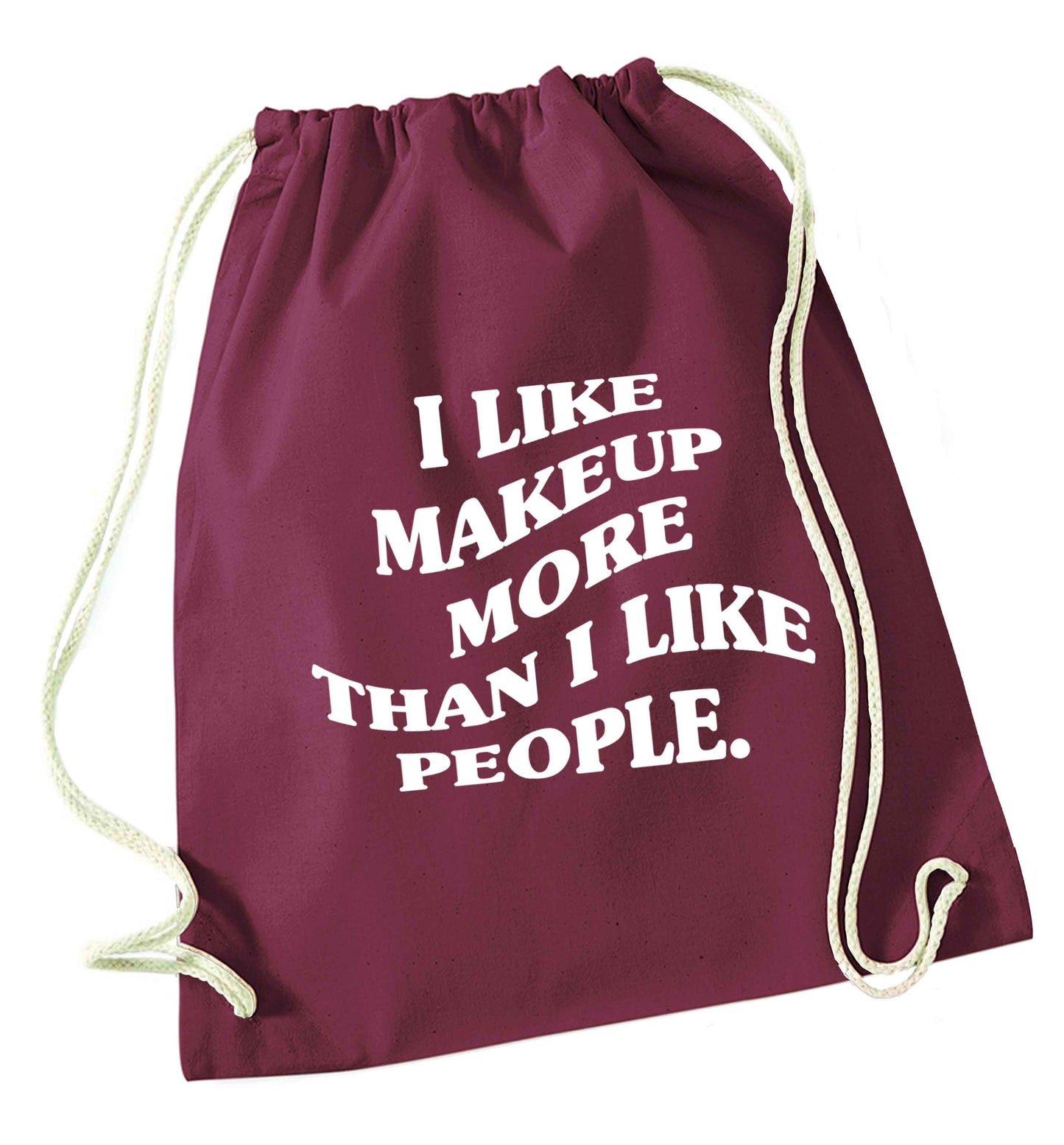 I like makeup more than people maroon drawstring bag