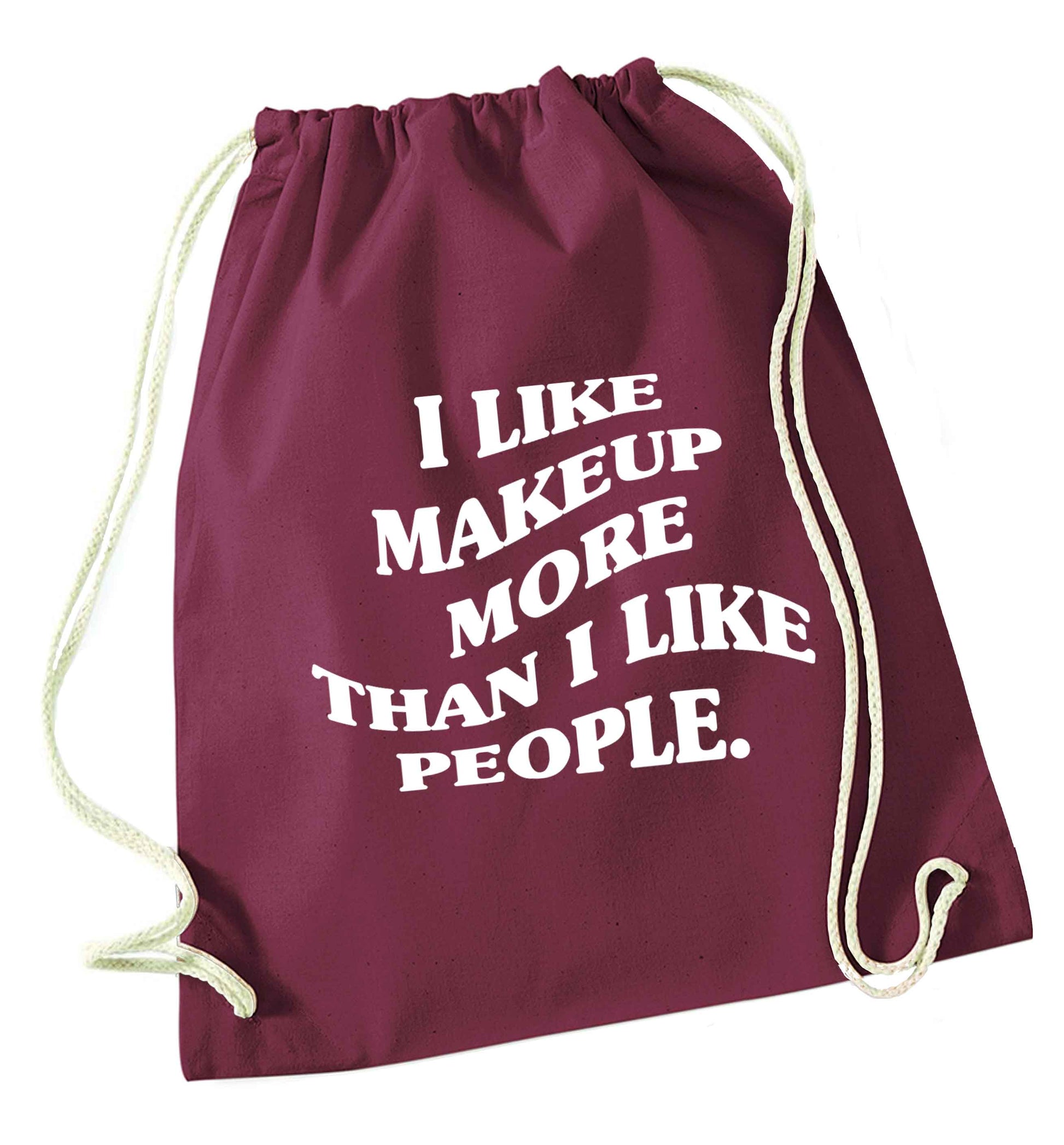 I like makeup more than people maroon drawstring bag
