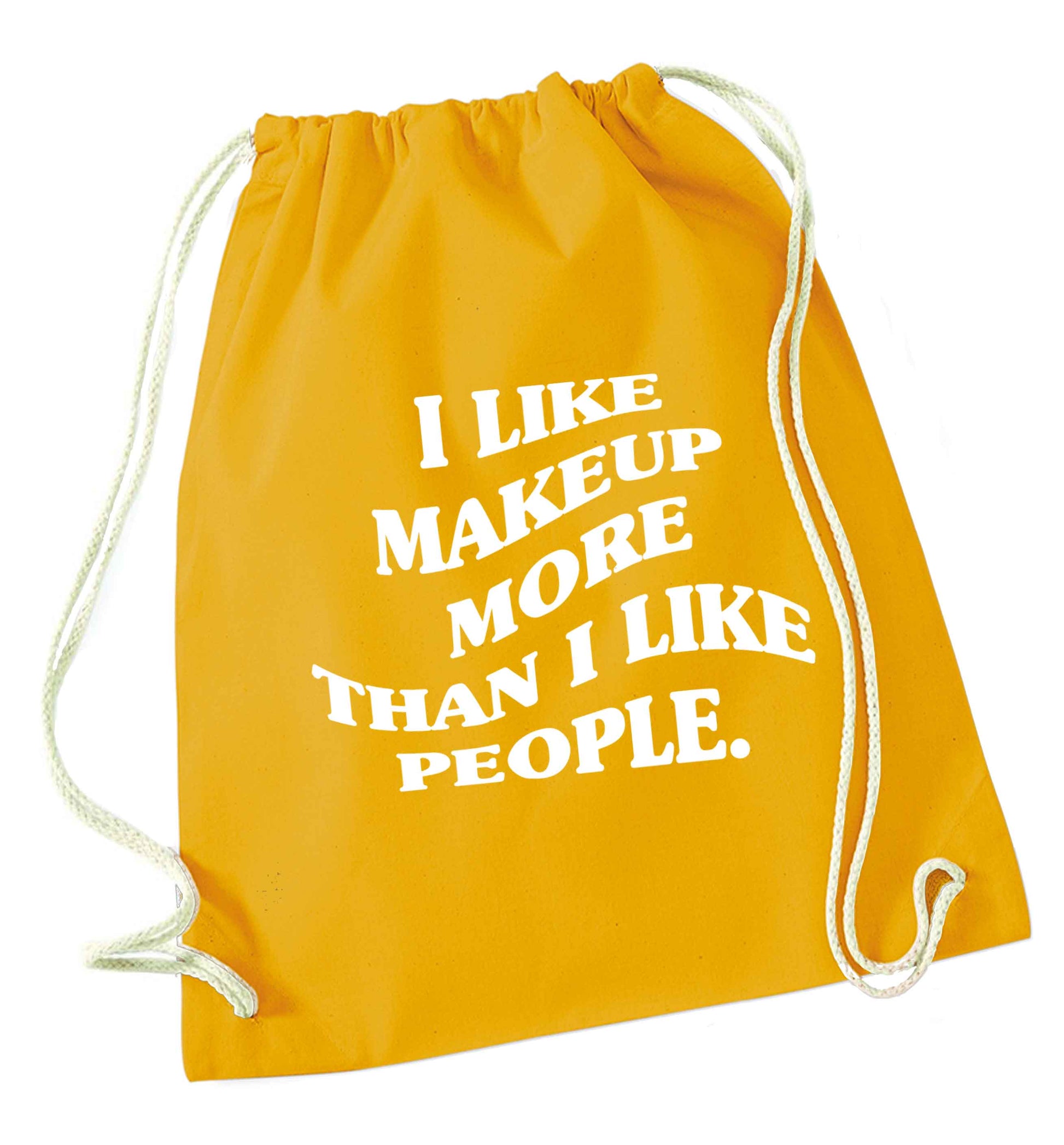 I like makeup more than people mustard drawstring bag