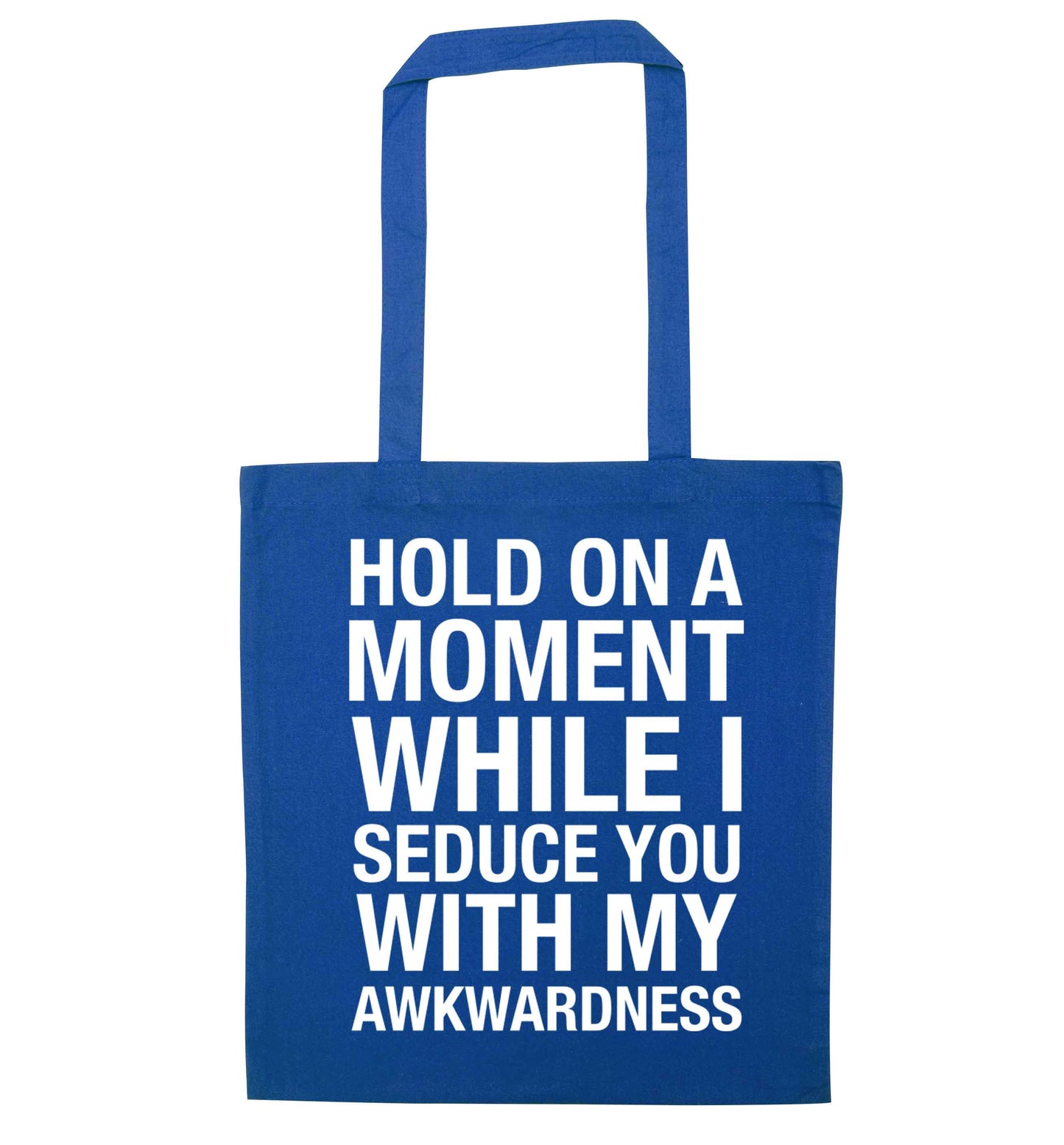 Hold on a moment while I seduce you with my awkwardness blue tote bag