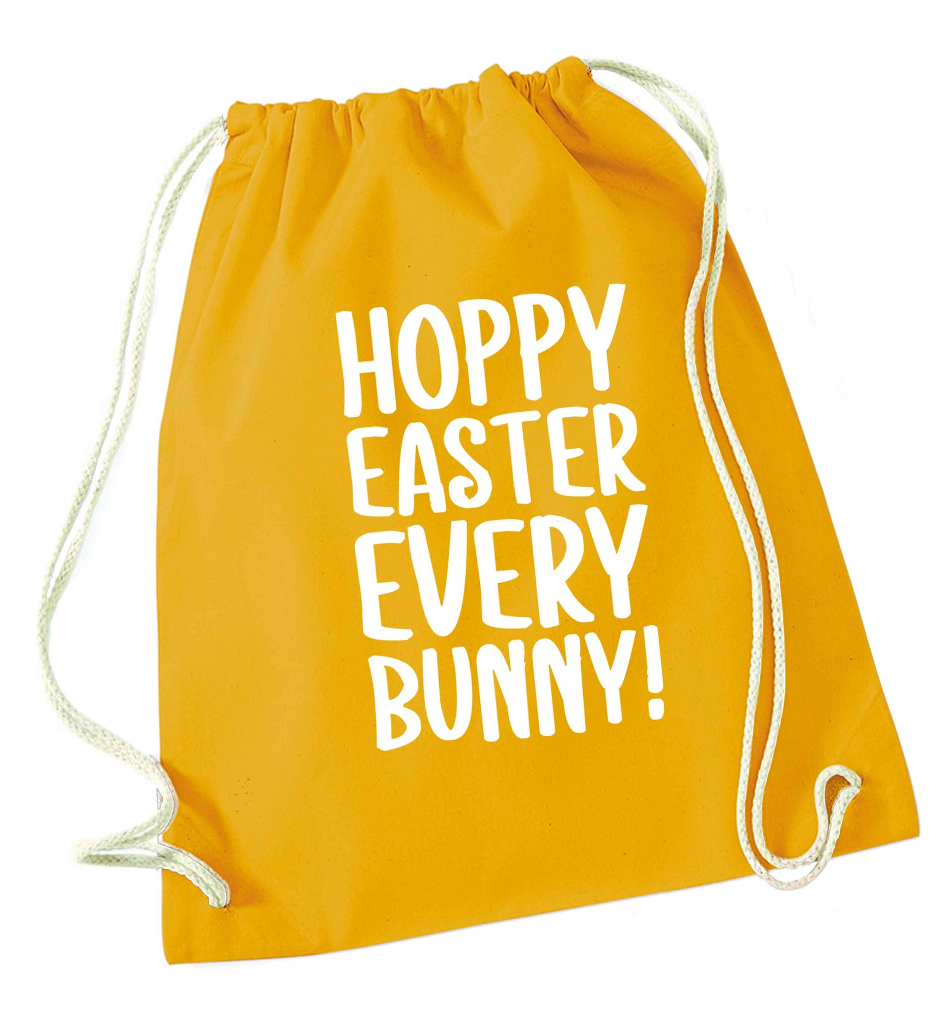 Hoppy Easter every bunny! mustard drawstring bag