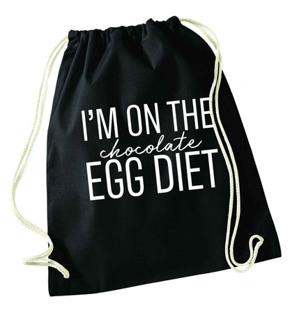 I'm on the chocolate egg diet black drawstring bag