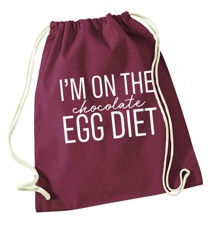 I'm on the chocolate egg diet maroon drawstring bag