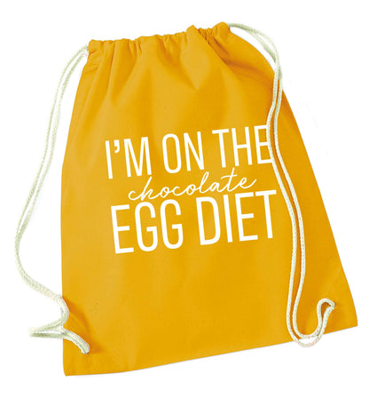 I'm on the chocolate egg diet mustard drawstring bag
