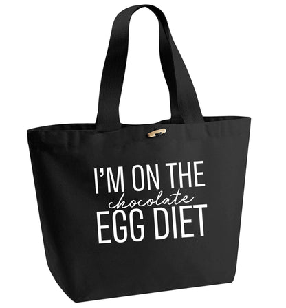 I'm on the chocolate egg diet organic cotton premium tote bag with wooden toggle in black