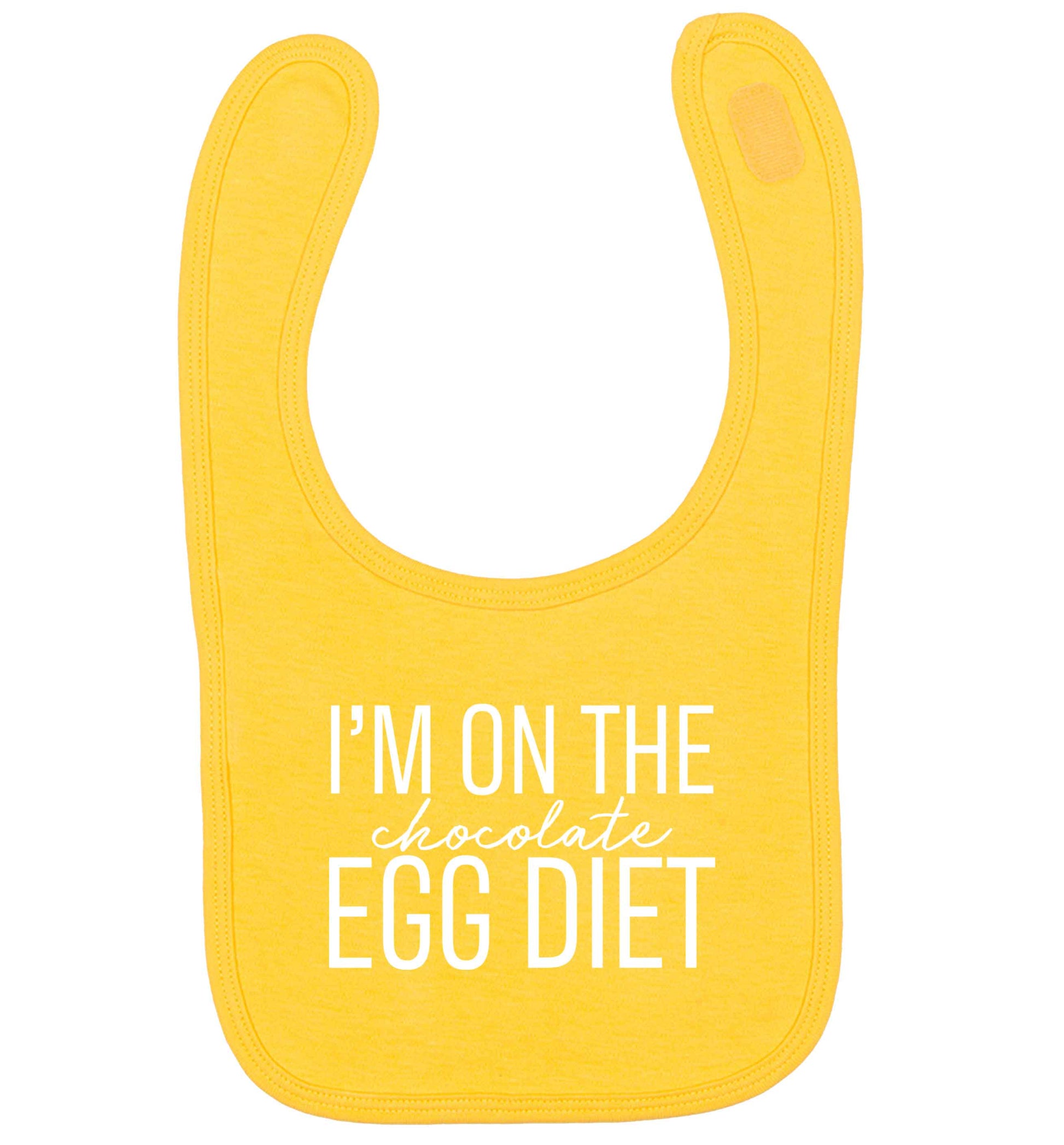 I'm on the chocolate egg diet yellow baby bib