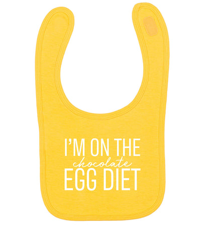 I'm on the chocolate egg diet yellow baby bib