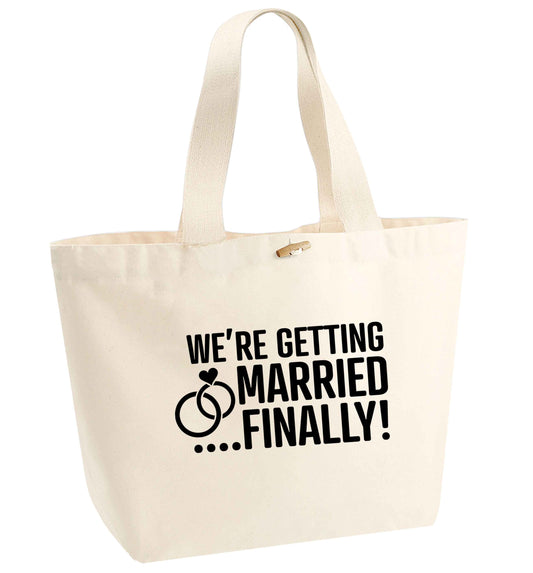 It's been a long wait but it's finally happening! Let everyone know you're celebrating your big day soon! organic cotton premium tote bag with wooden toggle in natural