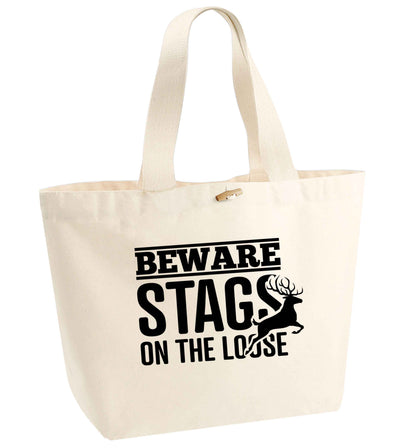 Beware stags on the loose organic cotton premium tote bag with wooden toggle in natural