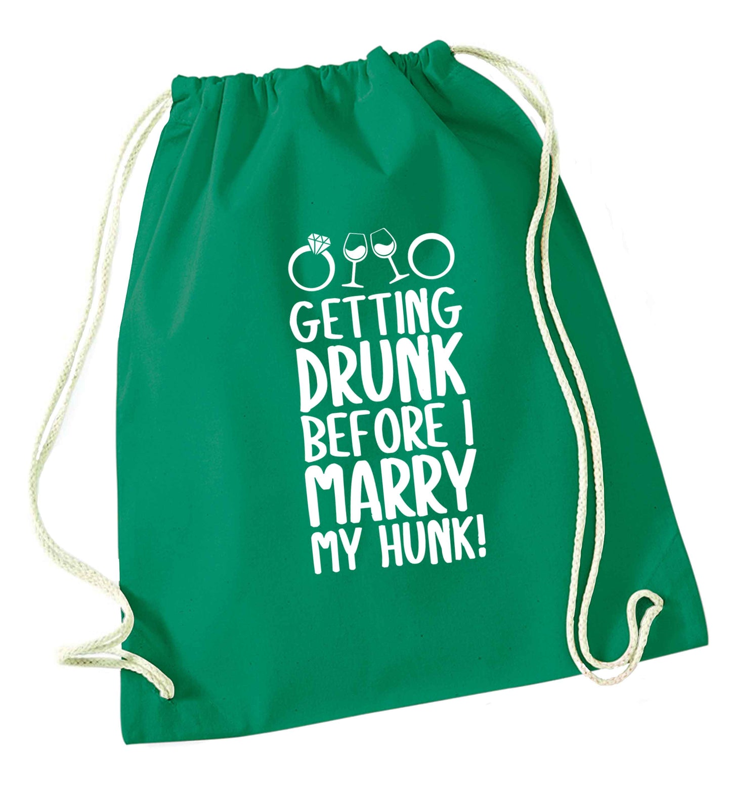 Getting drunk before I marry my hunk green drawstring bag