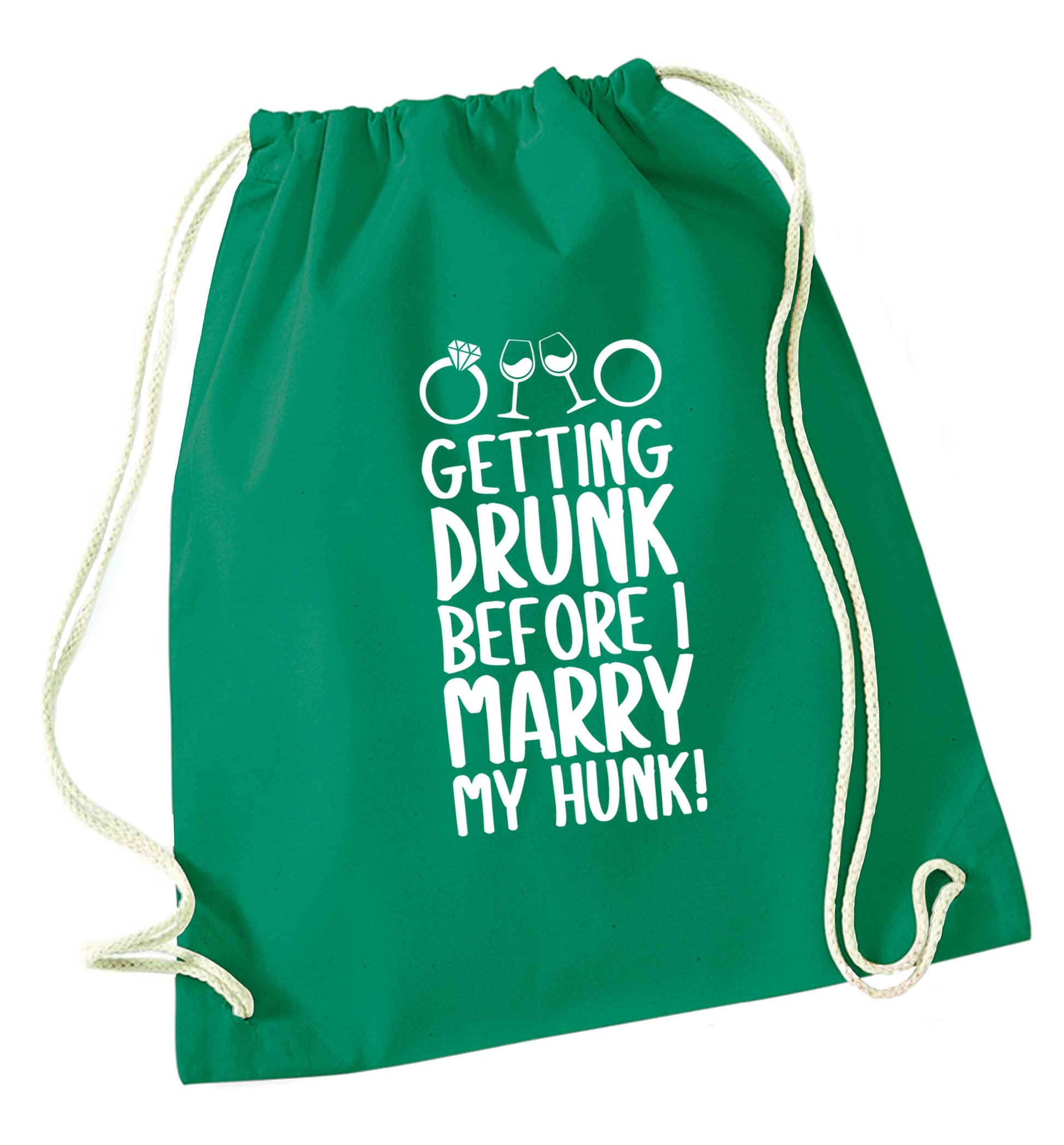 Getting drunk before I marry my hunk green drawstring bag