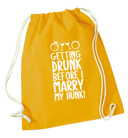 Getting drunk before I marry my hunk mustard drawstring bag