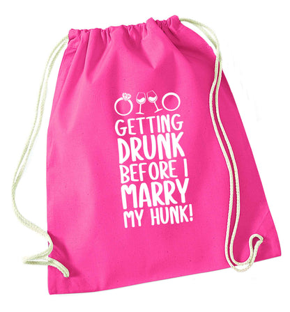 Getting drunk before I marry my hunk pink drawstring bag