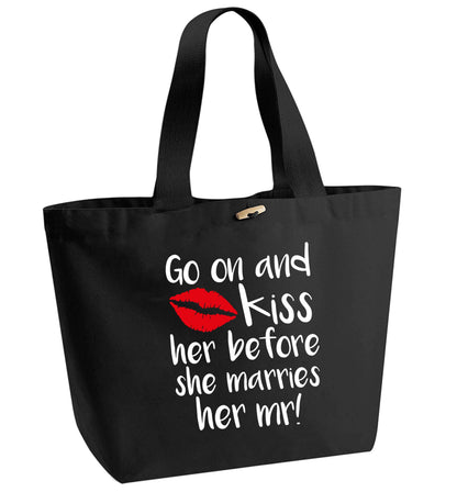 Kiss her before she marries her mr! organic cotton premium tote bag with wooden toggle in black