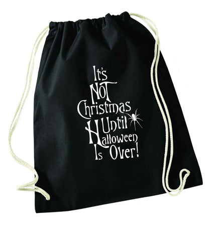 It's not Christmas until Halloween is over black drawstring bag