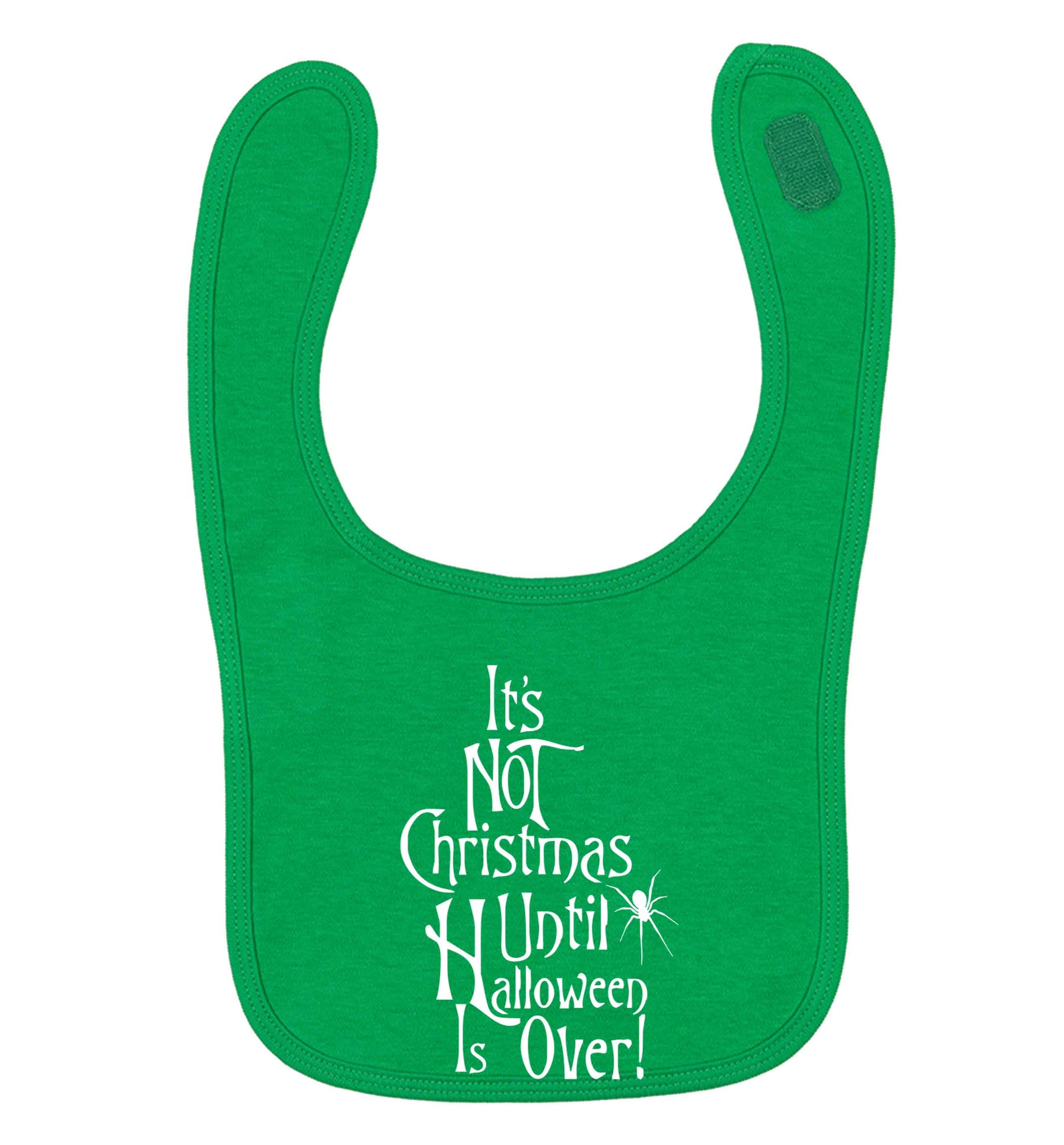 It's not Christmas until Halloween is over green baby bib