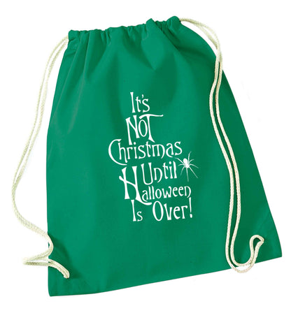 It's not Christmas until Halloween is over green drawstring bag