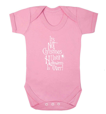 It's not Christmas until Halloween is over baby vest pale pink 18-24 months