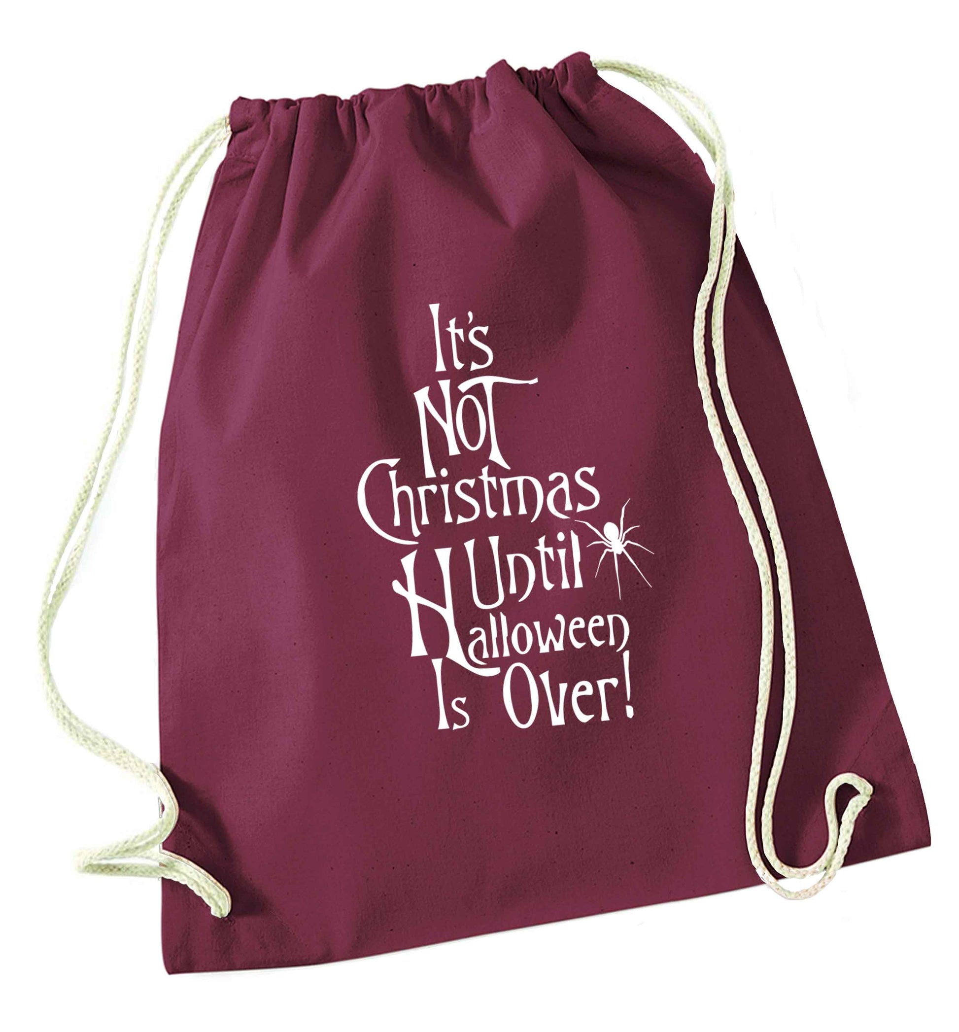 It's not Christmas until Halloween is over maroon drawstring bag