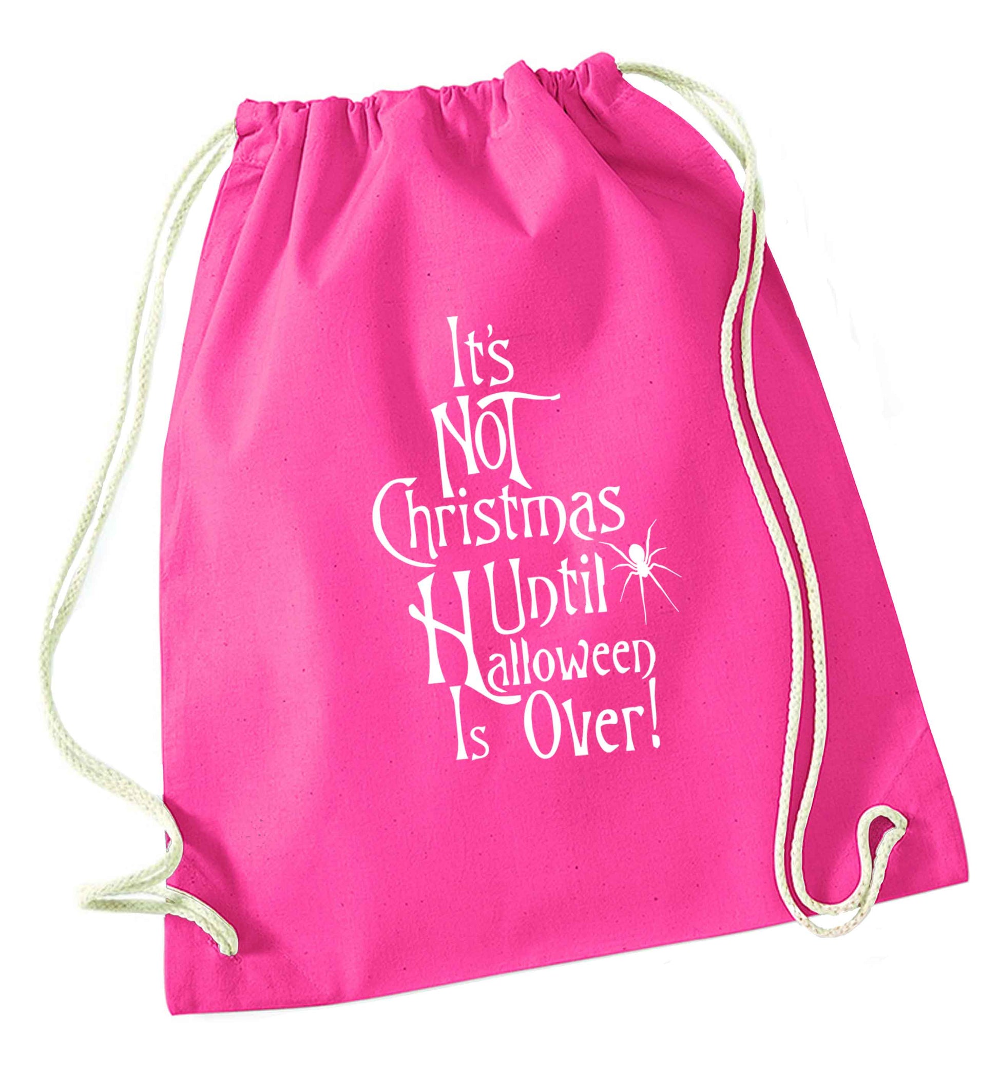 It's not Christmas until Halloween is over pink drawstring bag