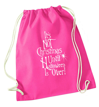 It's not Christmas until Halloween is over pink drawstring bag