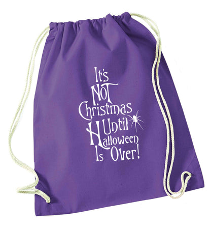 It's not Christmas until Halloween is over purple drawstring bag