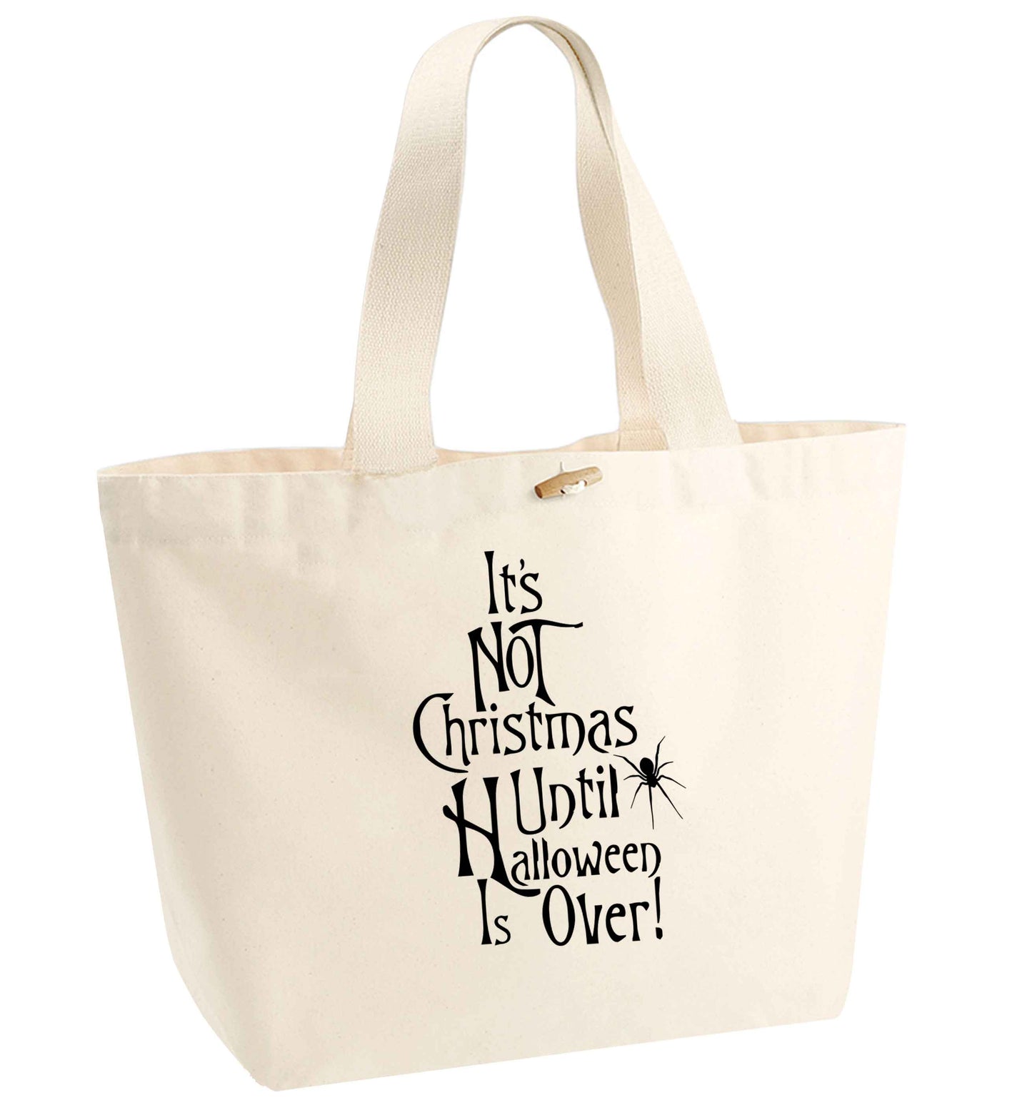 It's not Christmas until Halloween is over organic cotton premium tote bag with wooden toggle in natural