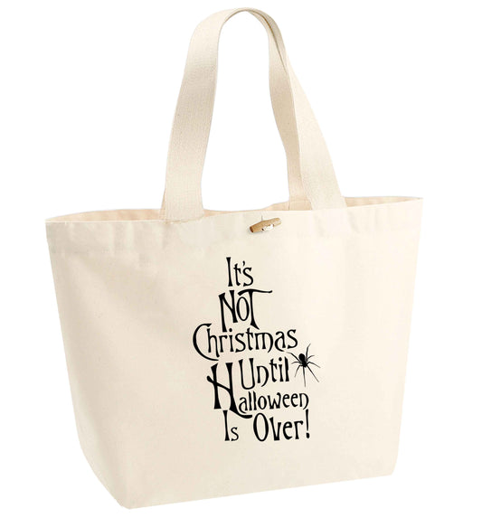 It's not Christmas until Halloween is over organic cotton premium tote bag with wooden toggle in natural
