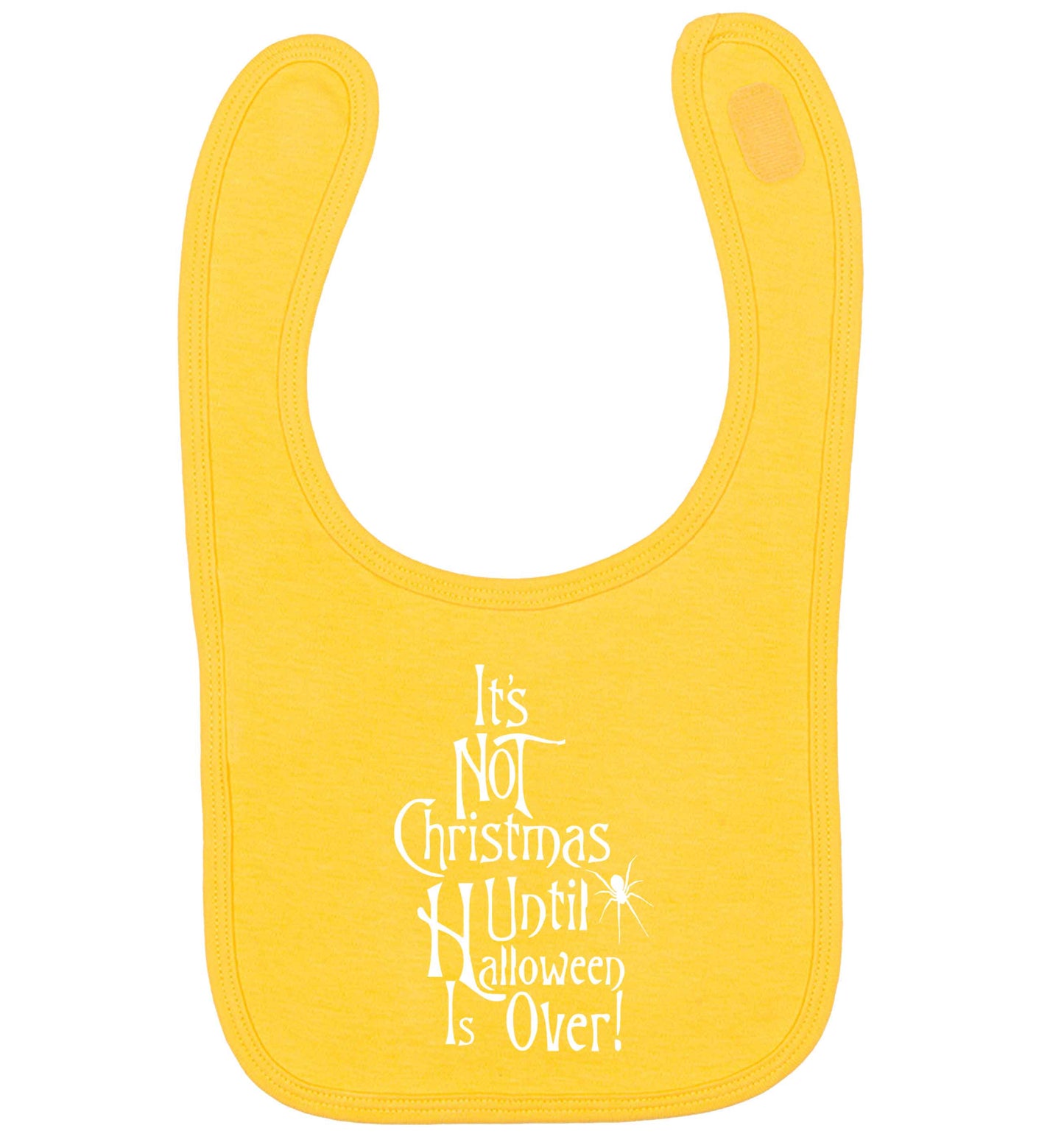 It's not Christmas until Halloween is over yellow baby bib