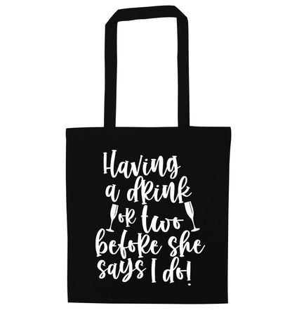 Having a drink or two before she says I do black tote bag