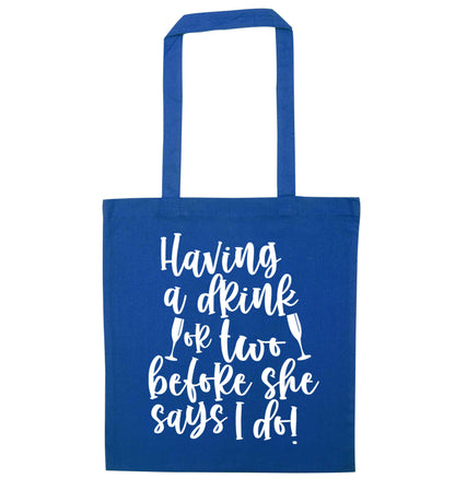 Having a drink or two before she says I do blue tote bag