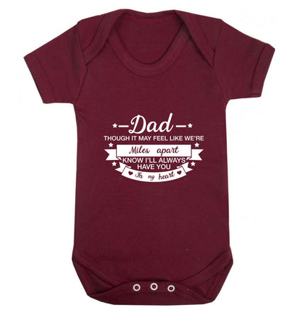 Dad though it may feel like we're miles apart know I'll always have you in my heart baby vest maroon 18-24 months