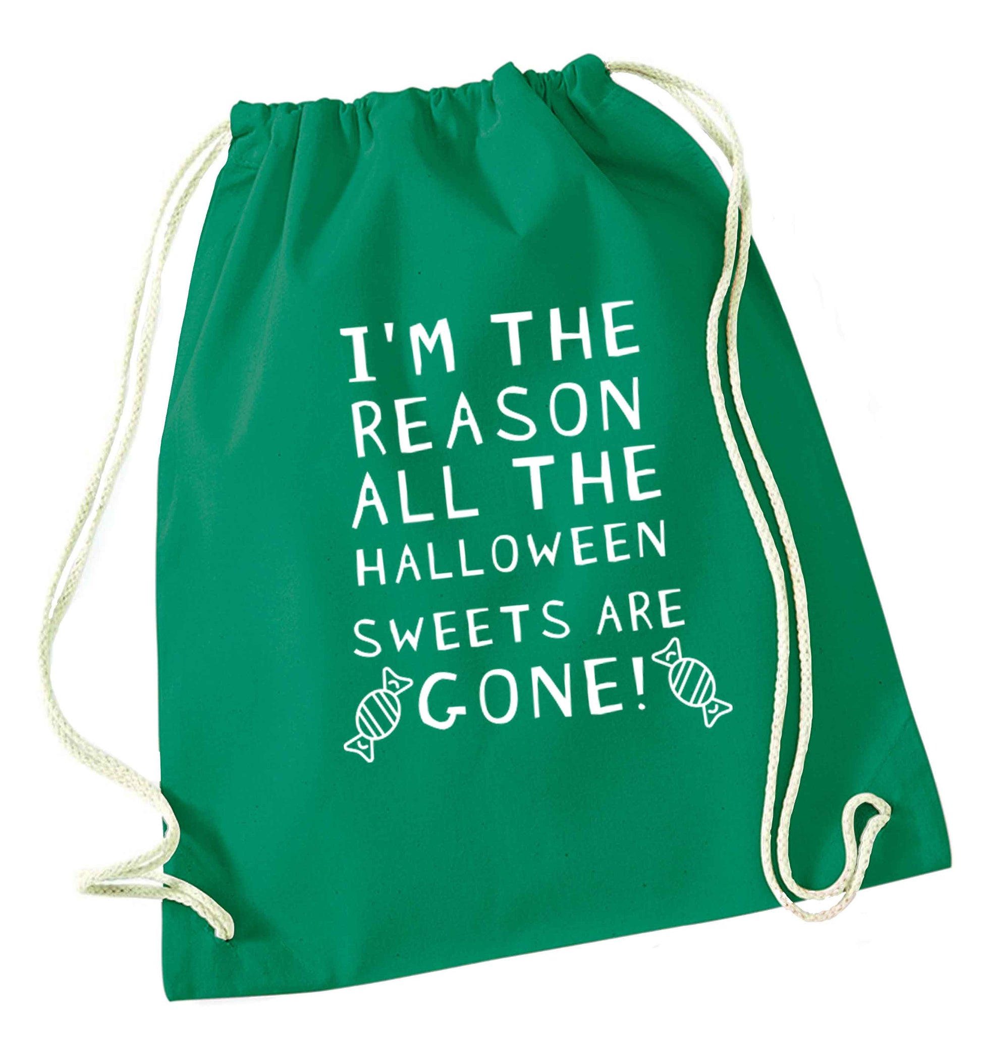 I'm the reason all of the halloween sweets are gone green drawstring bag