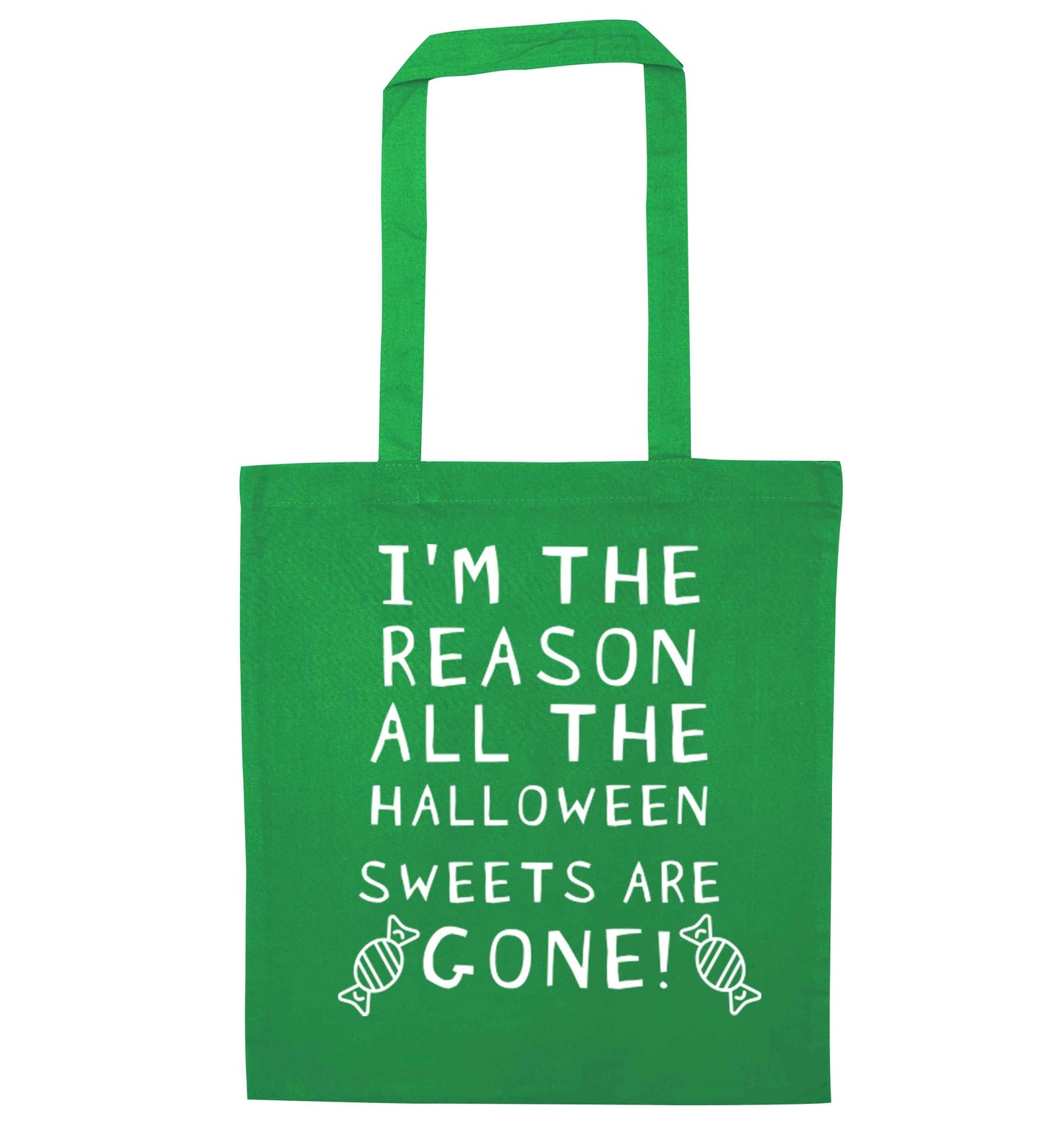 I'm the reason all of the halloween sweets are gone green tote bag