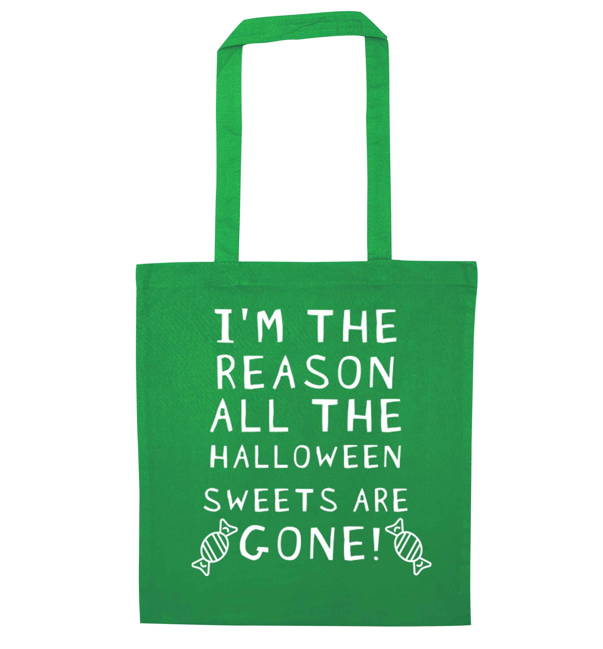 I'm the reason all of the halloween sweets are gone green tote bag