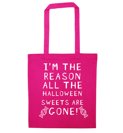 I'm the reason all of the halloween sweets are gone pink tote bag
