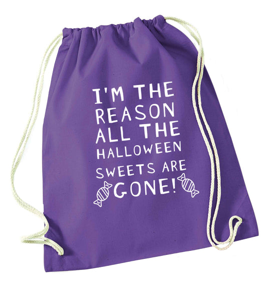 I'm the reason all of the halloween sweets are gone purple drawstring bag