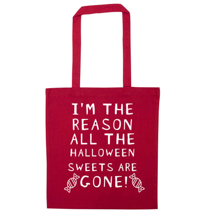I'm the reason all of the halloween sweets are gone red tote bag