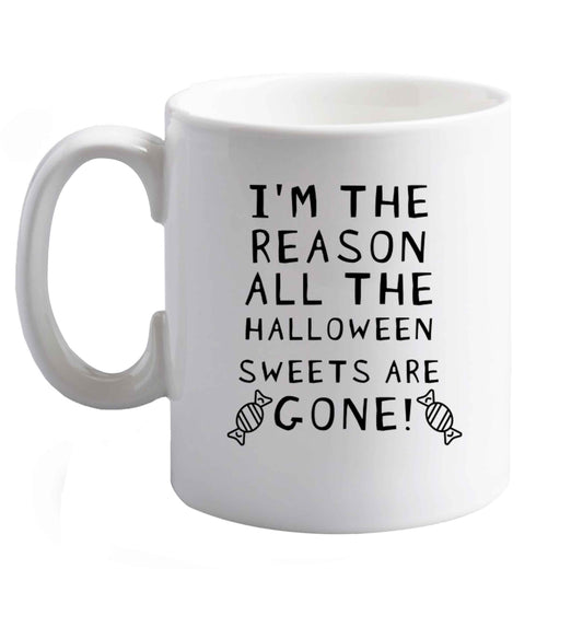 10 oz I'm the reason all of the halloween sweets are gone ceramic mug right handed